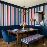 Highland Stripe wallpaper featuring pink, navy, and white vertical stripes.