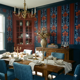 Patterned wallpaper from York Wallcoverings with dark blue and red stripes and leaf design in a dining room setting.