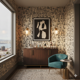 Atelier Faces Wallpaper with illustrated face pattern and tan background.
