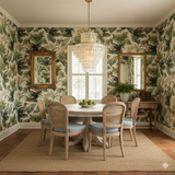 Isle of the Forgotten wallpaper with a tropical bird and foliage print, covering the walls of a dining room.