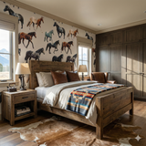 Painted herd wallpaper with a horse motif, covering a bedroom wall behind a wooden bed frame and nightstand.
