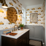 Novelty yellow taxi wallpaper with skyline details, and gold polka dots.