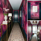 Garnet Nebula Wallpaper, a patterned design with pink and black hues, displaying a nebula effect on the walls of a hallway.