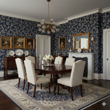 Astral Vine wallpaper in navy and white with leaf pattern, covering the dining room walls.
