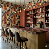 Vérité Assemblage Wallpaper with a collage of black and white portraits on orange and beige blocks.
