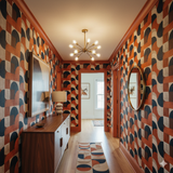 Vantage Curve wallpaper with an orange and navy geometric pattern, covering the hallway walls.
