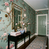 Floral wallpaper with bird design, verdant serenade pattern, and tree branches.
