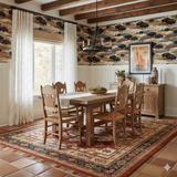 Bison Plains wallpaper with a brown animal print design, covering the dining room wall behind rustic wood furniture.