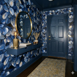 Midnight Littoral Wallpaper with blue abstract brushstroke pattern, textured with gold accents.