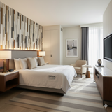 District wallpaper by Sable, in a vertical wood grain pattern with light and dark neutrals.