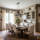 Saint Brumaire wallpaper with dog motif from Brewster Wallcovering, adorning dining room above wainscoting.