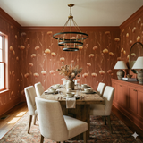 Amberfield Stems Wallpaper with floral pattern, covering a dining room wall, complemented by furnishings and decor.