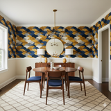 Blue and gold arch wallpaper with scalloped pattern on the upper walls, above a cream-colored lower wall.