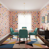Geometric Candy Arcade Wallpaper featuring a colorful triangle pattern, in a dining room setting.