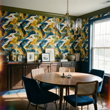 Ochre estuary wallpaper with abstract pattern, no brand attribution, in dining room setting with table and chairs.