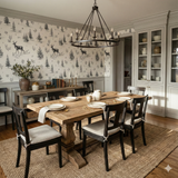 Pinecrest Stroll wallpaper with a black deer and tree pattern.