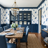 Fieldmouse Garden wallpaper with rodent pattern, floral arrangement, and dining table.