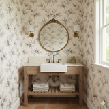 Saint Juniper Wallpaper with a white and gray plant pattern covering the bathroom walls.
