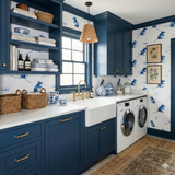 Botanical fieldmouse garden wallpaper with blue rodent pattern, along with traditional framed prints in a laundry room.
