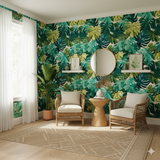 Tropical print wallpaper with monstera leaf design, in shades of green, over a cream backdrop.