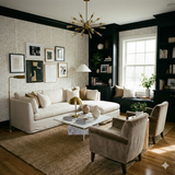 Champagne stipple wallpaper with gold polka dot pattern, covering the walls in a styled living room.
