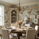 Fawnlight Meadow Wallpaper with animal and floral patterns, covering the walls of a stylish dining room.
