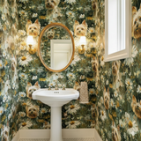 Meadow Yorkie Wallpaper with dog and floral pattern on the wall of a powder room.
