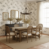 Saint Juniper wallpaper featuring a botanical pattern, with delicate branches and berries printed on a light background.