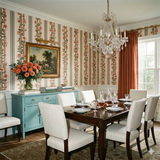 Floral stripe Dahlia Regency Wallpaper with peach blooms, shown on a dining room wall.
