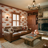 Southwestern-inspired wallpaper featuring orange sunburst pattern, set in a room with rustic accents.
