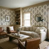 Folia Noir Wallpaper with a leaf pattern on a beige background.