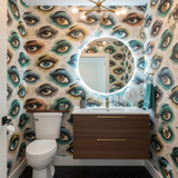 The Watchers Wallpaper with colorful eye pattern on white dotted background.