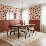 Carmine Bloom Wallpaper with red floral design on a beige background.
