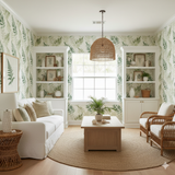 Fern wallpaper with a botanical print of green fronds covering the wall.
