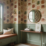 Mug pattern wallpaper from Copper Mule Market, in a beige and multicolor motif, on a sage green wall.
