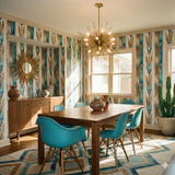 Azulé Mirage Wallpaper with blue and beige pattern, over a dining room setup featuring wood furniture.