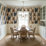 Park Row Wallpaper with dog motif pattern covering the walls of a dining room setting.