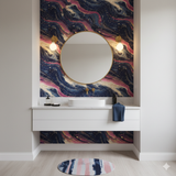 Celestine Veins Wallpaper with swirling navy, pink, and gold patterns, adding depth and texture to the wall above the vanity.