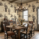 High Noon Revenant Wallpaper in beige, with a sketched cowboy skeleton and cactus pattern.