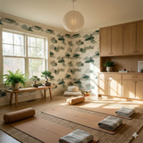 Greenwood Shallows Wallpaper with a leafy water pattern, covering the walls of a bright, sunlit room.