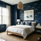 Blue Palm Nocturne Wallpaper with palm tree pattern, covering the bedroom walls.