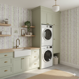Lavender trellis wallpaper with a leaf pattern, featuring vertical rows of purple and green leaves.