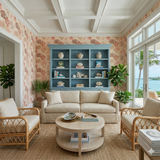 Coraline Etude wallpaper with coral pattern, covering the walls of a living room with coastal decor.
