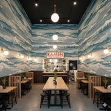 Blue mountain range patterned Shiroyama Wallpaper with trees from the shop covers the walls.
