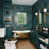 Patterned Timberline wallpaper with gold trees on teal background, from Auric, in styled bathroom setting.
