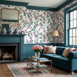 Floral Rosetti Vine wallpaper featuring roses and vines with a white background.

