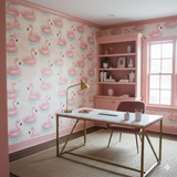 Coral Drift Flock wallpaper with flamingo pattern, decorating an office interior with desk and bookcase.