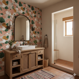 Sonora Clay wallpaper with a terrazzo pattern, featuring green, salmon, and yellow tones.