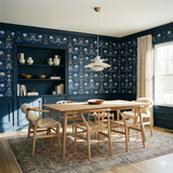 Nordhavn Bloom Wallpaper in dark blue floral pattern by Boråstapeter, accenting dining room interior.