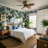 Conch House Reverie Wallpaper featuring blue houses and palm trees pattern, on the bedroom wall.